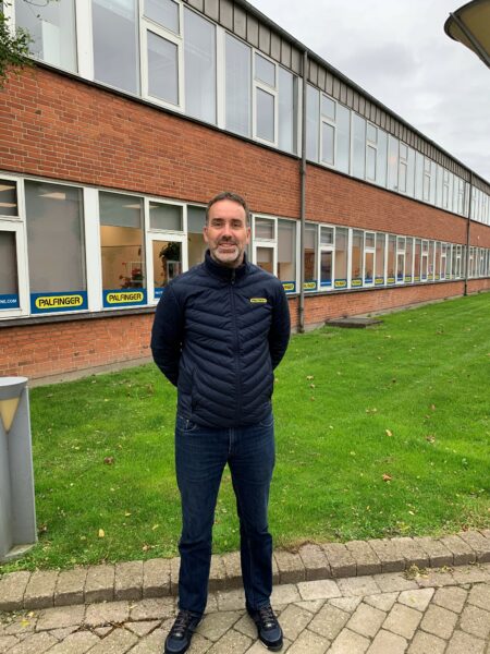 Daniel Løfberg, PALFINGER Service Coordinator, in front of the office in Munkebo, Denmark