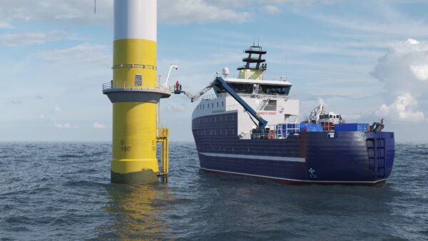 Service operation vessel (SOV) next to an offshore wind turbine. Offshore workers are transferred from the deck of the vessel to the turbin platform via a crane-like system - called OPTS.