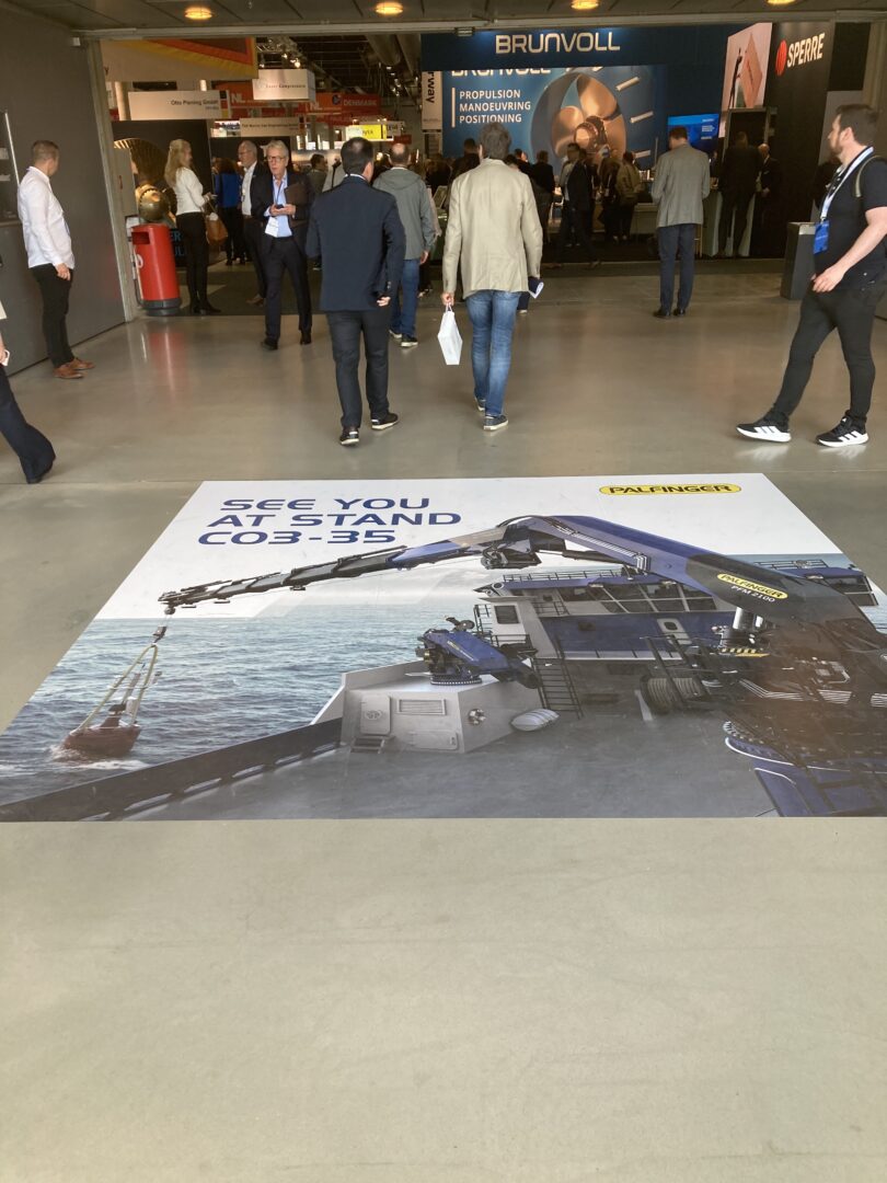 Picture of a floor sticker at the hall entrance