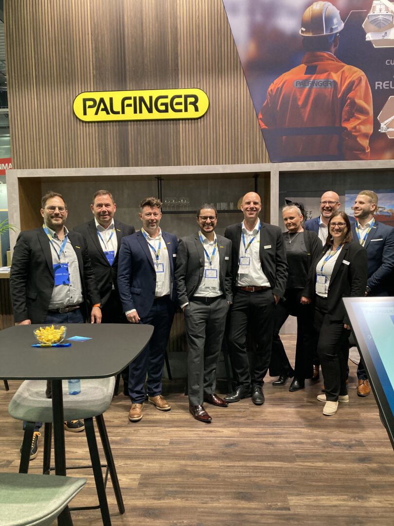 Picture showing the PALFINGER MARINE people present at the booth